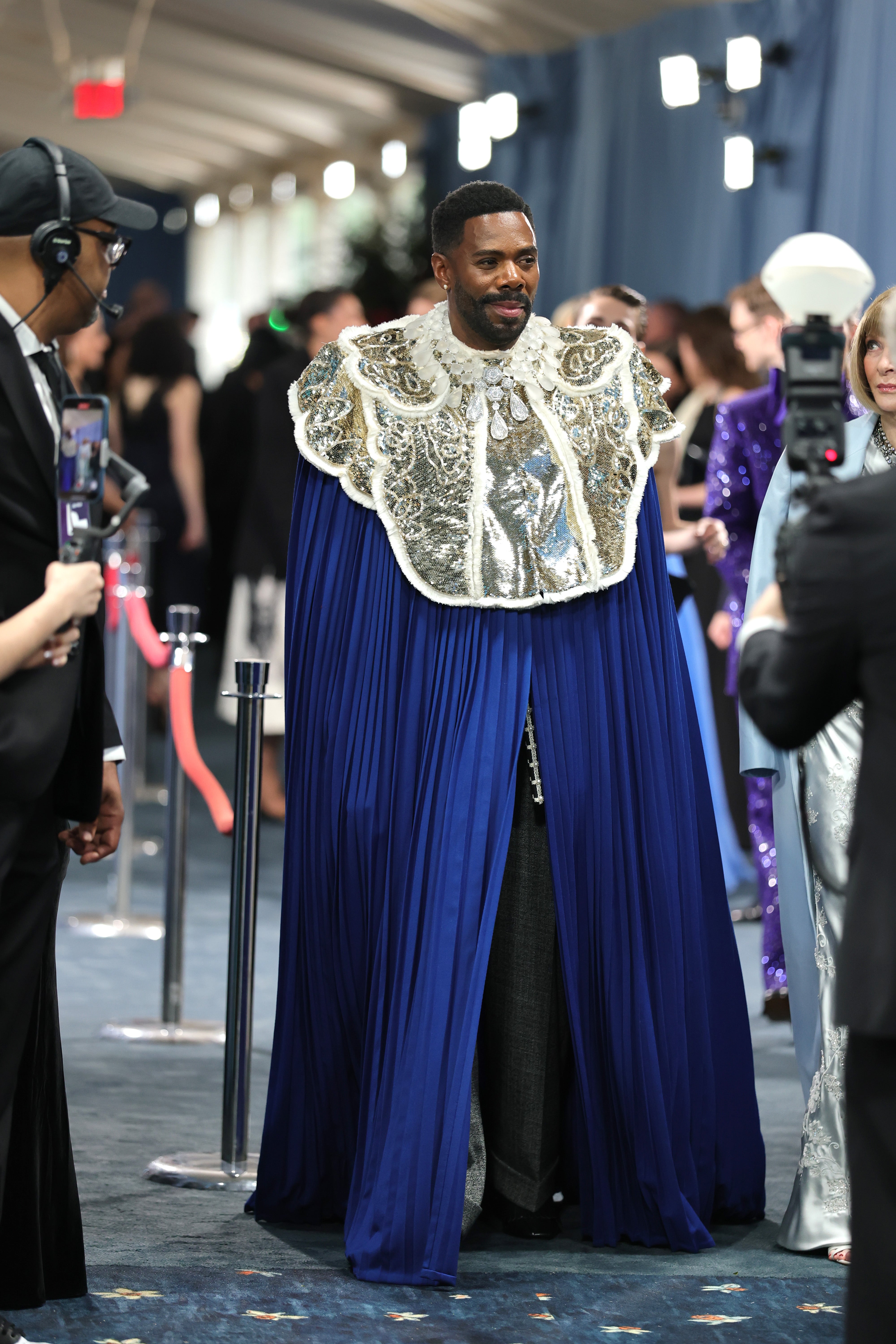 Met Gala co-chair Colman Domingo wore a custom blue robe by Valentino. The look included white fabric chest armor, which he complemented with a diamond statement necklace